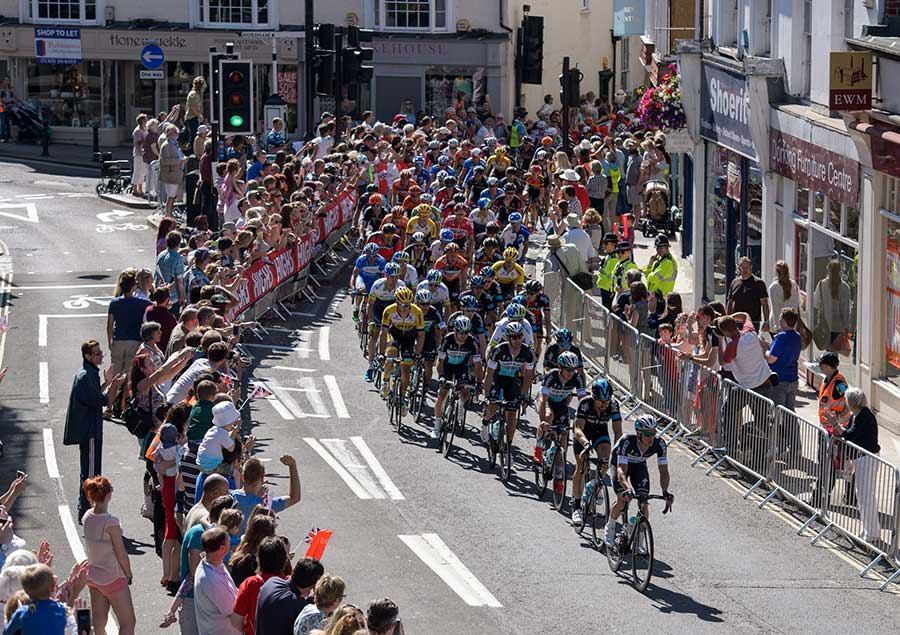 Prudential RideLondon cyclists watched by crowds of people